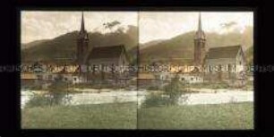 Blick über Fluss Salzach zur Kirche von Niedernsill