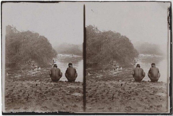 Two spectators at the Kayapó fish festival