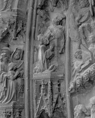 Portal mit Vorhalle — Linke Archivolten — Innere Archivolte — Der heilige Joachim opfert ein Lamm