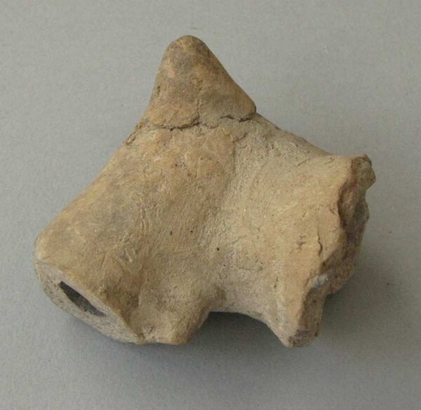 Clay animal head (fragment)