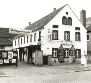 Coswig, Hauptstraße 25. Ehemaliger Dreiseithof. Wohnstallhaus (1851/1900). Straßenansicht
