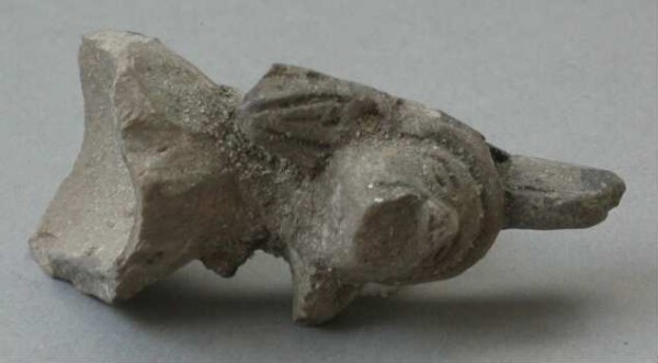 Fragment of a clay rattle (clay head)