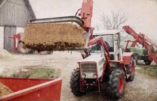 Fotografie: Siloblockschneider, Silageentnahme, Flachsilo, Flachsilofräse, Frontanbau, Frontlader, Ein- und Auslagerungstechnik