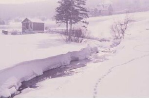 Blick auf eine Ortschaft im Erzgebirge im Winter