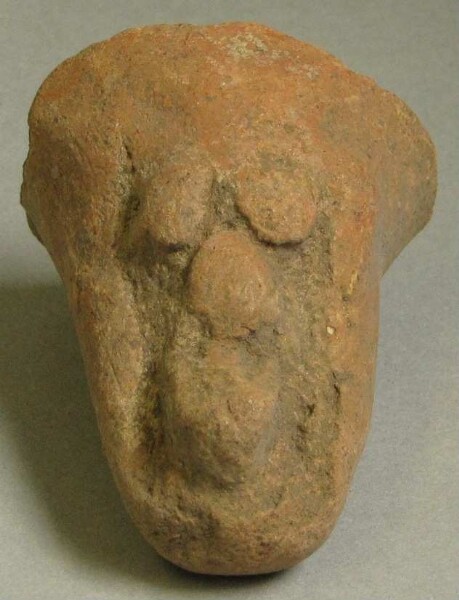 Clay animal head as a vessel base