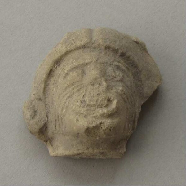 Clay head (fragment)