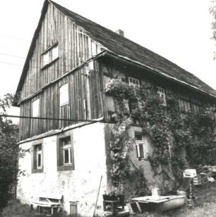 Colditz-Thumirnicht, Thumirnichter Platz 4. Wohnstallhaus mit Scheune (2. H. 19. Jh.). Wohnstallhaus. Hofansicht