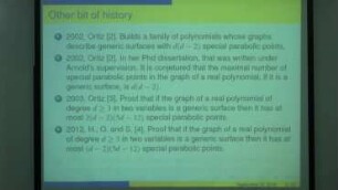 On the number of transversal special parabolic points in the graph on a real polynomial