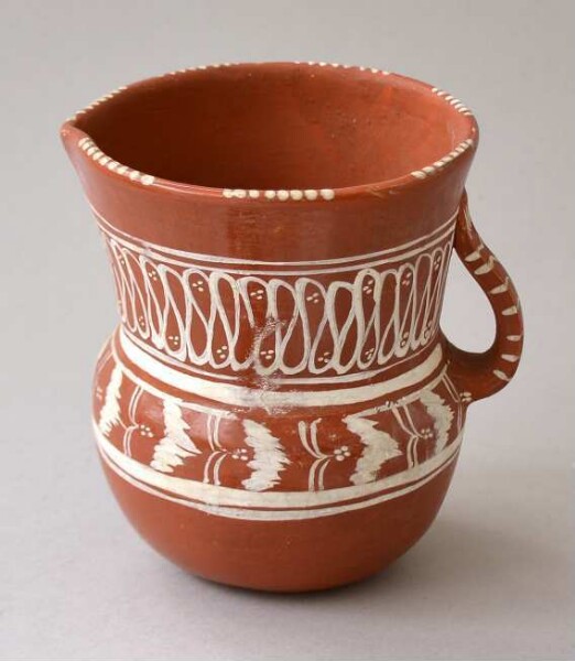 Clay jug with handle