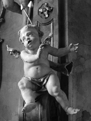 Putten mit Leidenswerkzeugen Christi