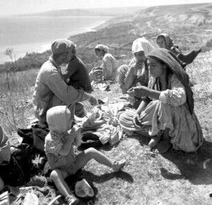 Kleine Dorfgemeinschaft beim Picknick