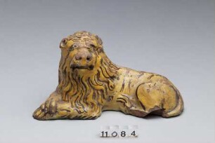 Figur eines liegenden Löwens