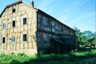 Fachwerkgebäude am alten Gutshof, leerstehend