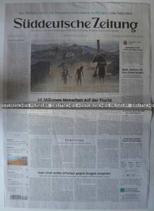 Tageszeitung "Süddeutsche Zeitung" mit Titel zur weltweiten Flucht und Migration