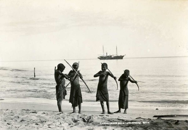 "Guadalcanalar boys shooting bows." (OT)