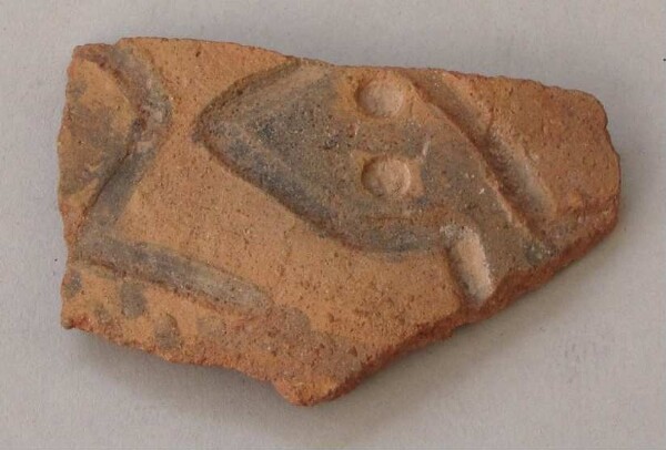 Fragment of a clay vessel