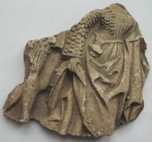 Fragment einer unglasierten Kachel