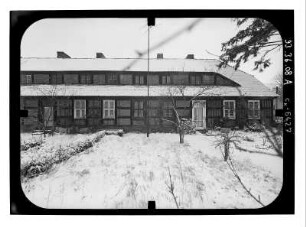 Baruth/Mark-Glashütte, Hüttenweg 8. Arbeiterwohnhaus (um 1840). Gartenfront