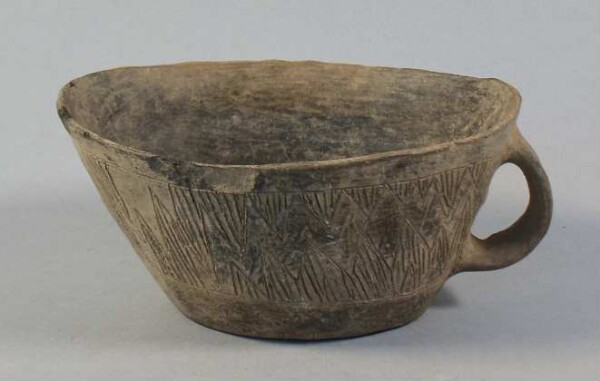 Clay vessel with handle