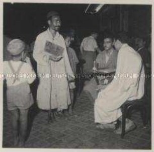 Tunis, Familienvater - erblindet