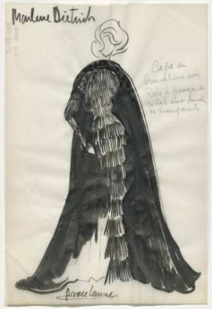 Marlene Dietrich - Ein schmales, vielfach gestuftes, langes Fransenkleid mit Umhang (Archivtitel)