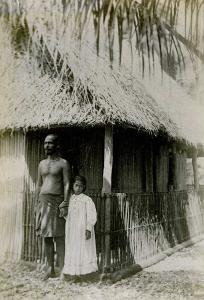 "Half-white man with child, Nauru"