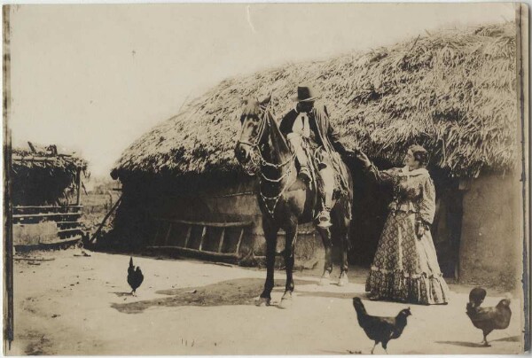 Gaucho in front of a hut