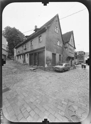 Pößneck, Obere Johannesgasse 6. Wohnhaus (Bezeichnung 1561). Straßenansicht mit Nachbarhaus