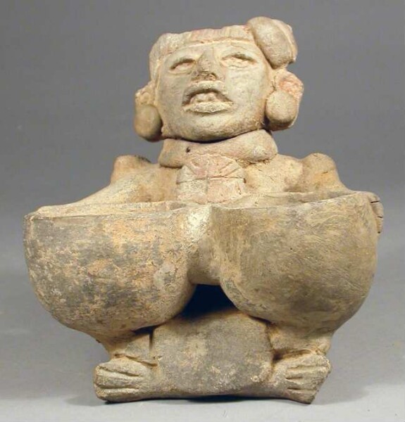 Clay figure with double vessel