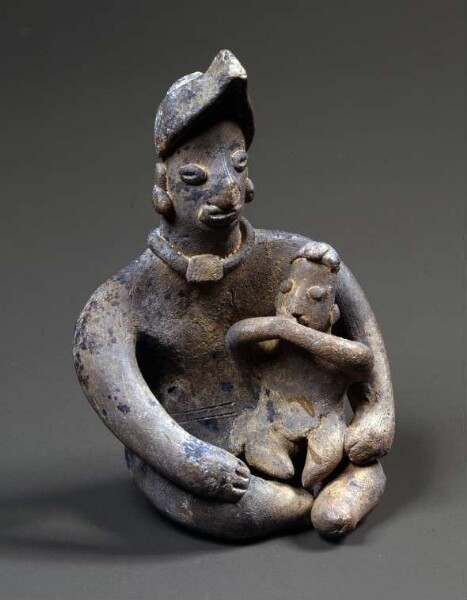 Sitting woman with child