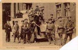 Revolutionäre mit Panzerwagen im Schlosshof