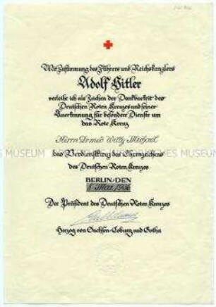 Verleihungsurkunde für das Verdienstkreuz des Deutschen Roten Kreuzes an den Arzt Dr. Michael - Personenkonvolut