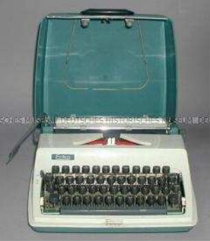 Erika-Kleinschreibmaschine, Modell E 43, mit Rechnung und Garantieschein