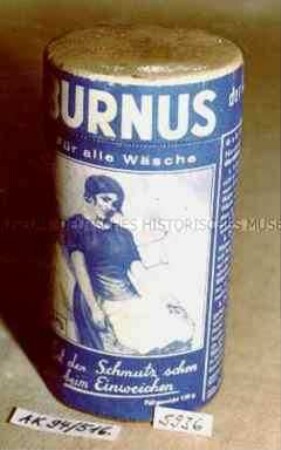 Pappdose für "BURNUS Für alle Wäsche 40 Pfg. Löst den Schmutz schon beim Einweichen" mit Inhalt (Abbildung einer jungen Frau mit Wäschekorb)