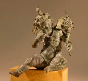 Römische Statuette des sitzenden Harpokrates