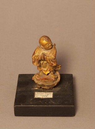 Figur des Shancai tongzi, des Pilgers Sudhana, eines Schülers der Guanyin