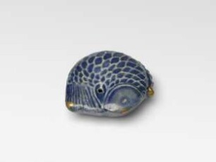 Wassertropfer in Form eines Fisches