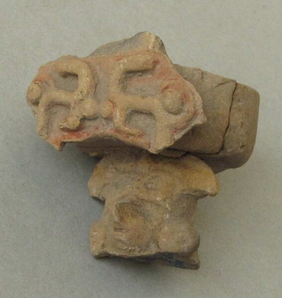 Clay head (fragment)