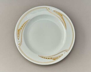 Flacher Teller mit goldenem Dekor