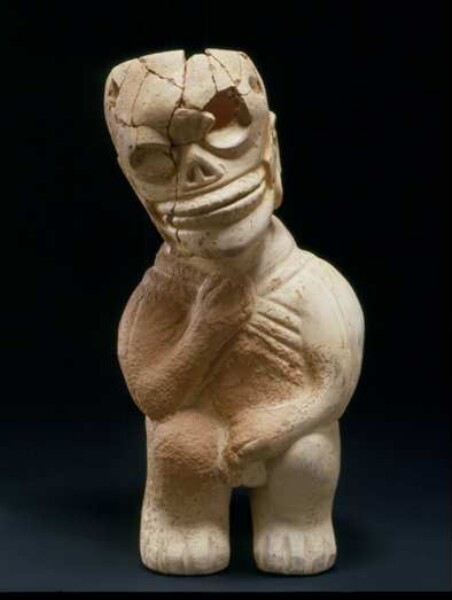 Anthropomorphic seated figure with skull