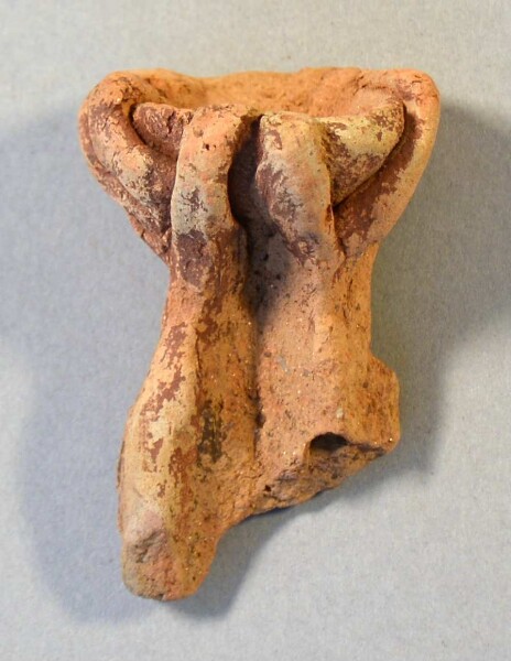 Hands holding a bowl, part of a large funerary urn