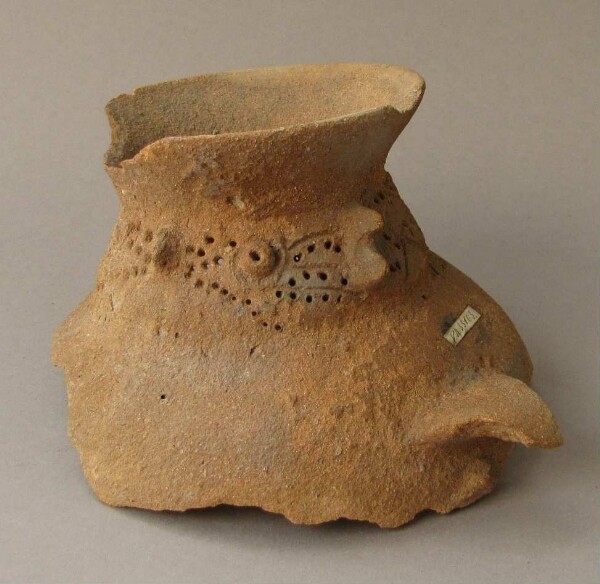 Fragment of a clay vessel