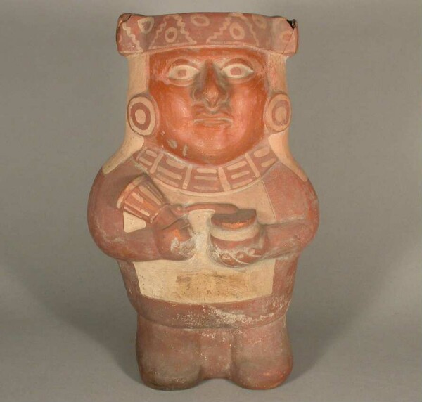 Standing anthropomorphic figure with lime container