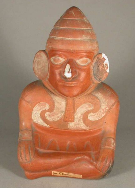 Seated anthropomorphic figure