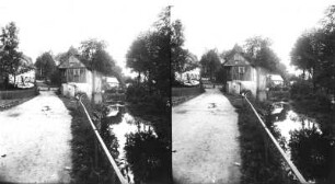 Seifhennersdorf-Läuterau. Wohnhaus Nummer 8. Blick über die Mandau flussabwärts