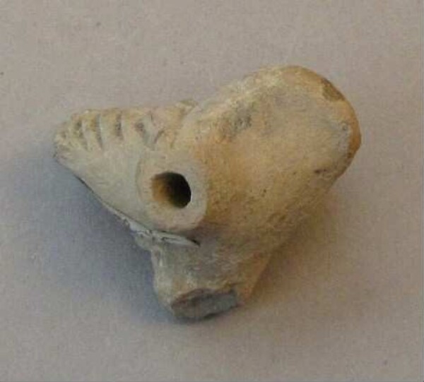 Fragment de figurine en argile