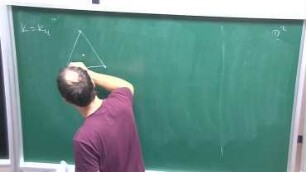 Embeddings of k-complexes into 2k-manifolds