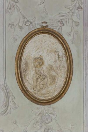 Stuckreliefs mit Puttendarstellungen — Putto mit Hund