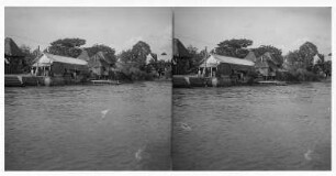 Häuser am Pasig River bei Manila : Weltreisen. Philippinen. Nipa-Hütten am Pasig bei Manila