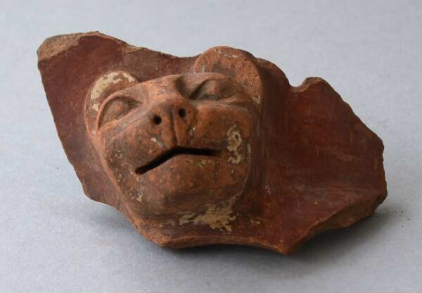 Clay animal head (fragment)